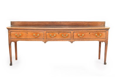 Lot 340 - A George III oak dresser base