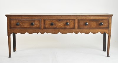 Lot 548 - An 18th century oak dresser base