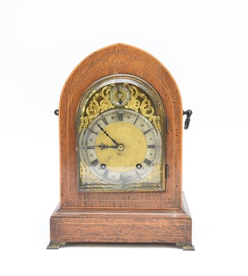 Lot 445 - An early 20th century lancet top inlaid rosewood bracket clock