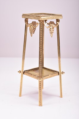 Lot 368 - A French gilt-metal and onyx miniature plant stand