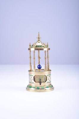 Lot 380 - A Eugene Farcot enamelled brass mystery alarm clock