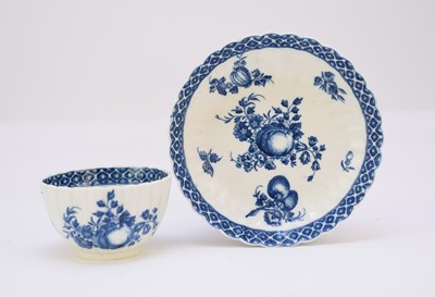 Lot 175 - Caughley 'Apple and Damsons' fluted tea bowl and saucer, circa 1780-85