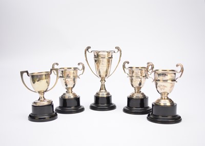Lot 20 - Four silver trophy cups and a plated example