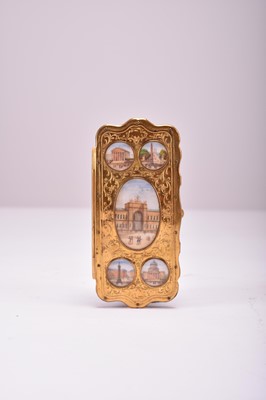 Lot 364 - A continental gilt metal and miniature inset aide memoire