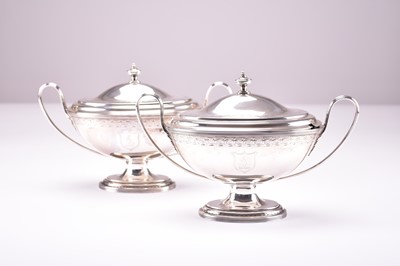 Lot 17 - A pair of George III silver sauce tureens and covers
