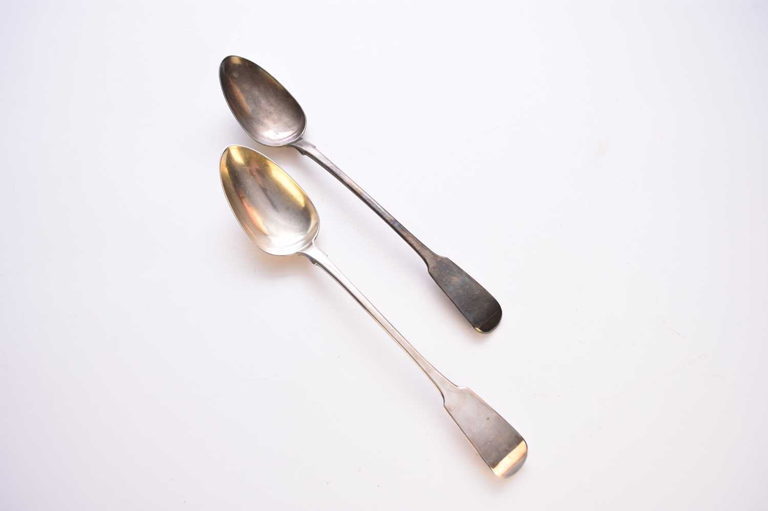 Lot 19 - Two George III silver basting spoons