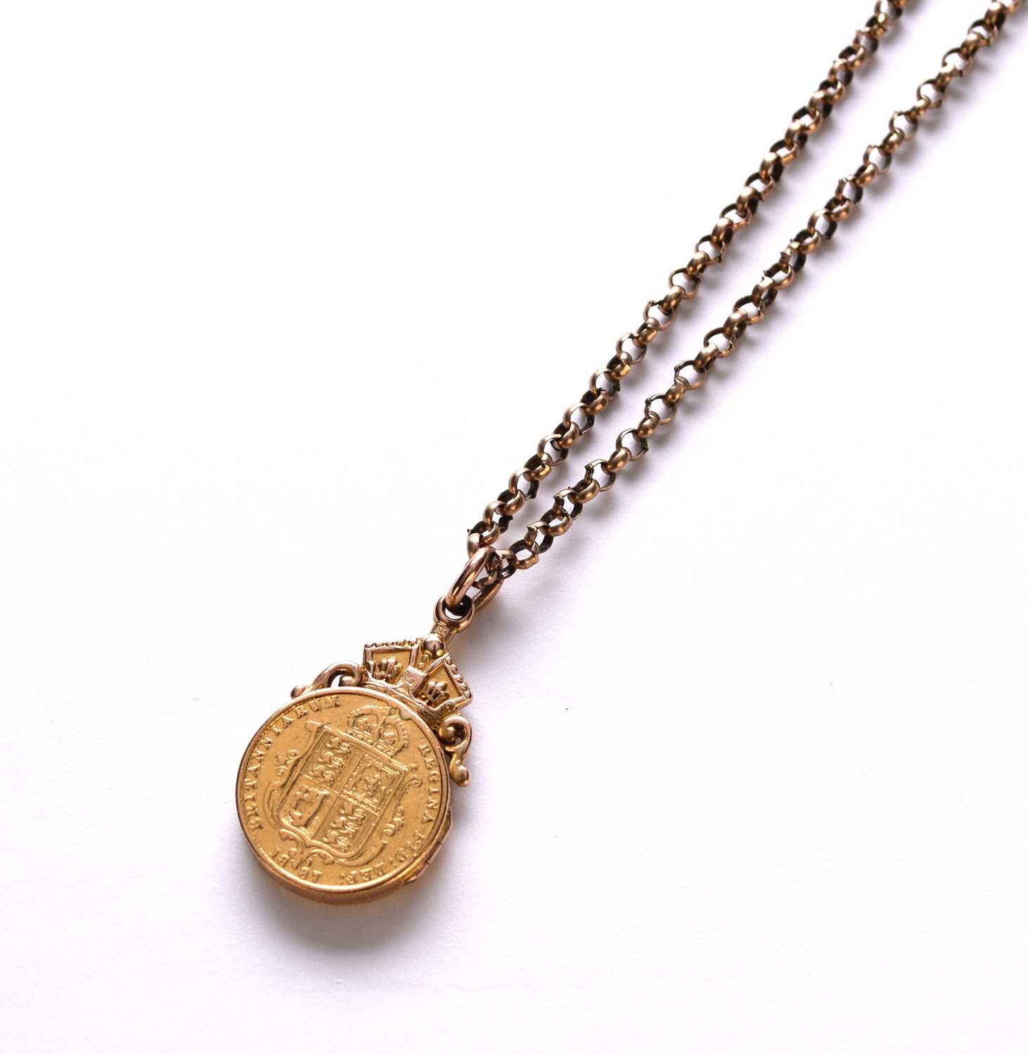 Lot 63 - A Victorian coin set pendant on chain