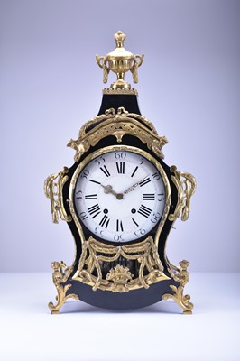 Lot 180 - A 19th century Louis XV style ebonised bracket clock and bracket