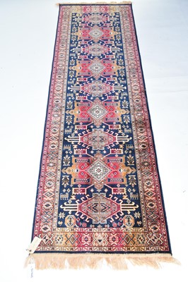 Lot 585 - A Heriz runner