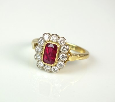 Lot 46 - An 18ct gold ruby and diamond cluster ring