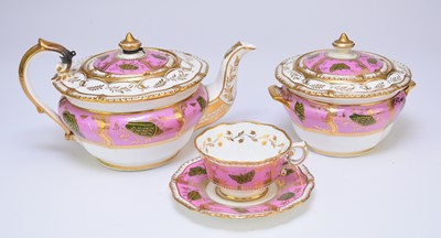 Lot 73 - A H&R Daniel teapot, sucrier and matching teacup and saucer