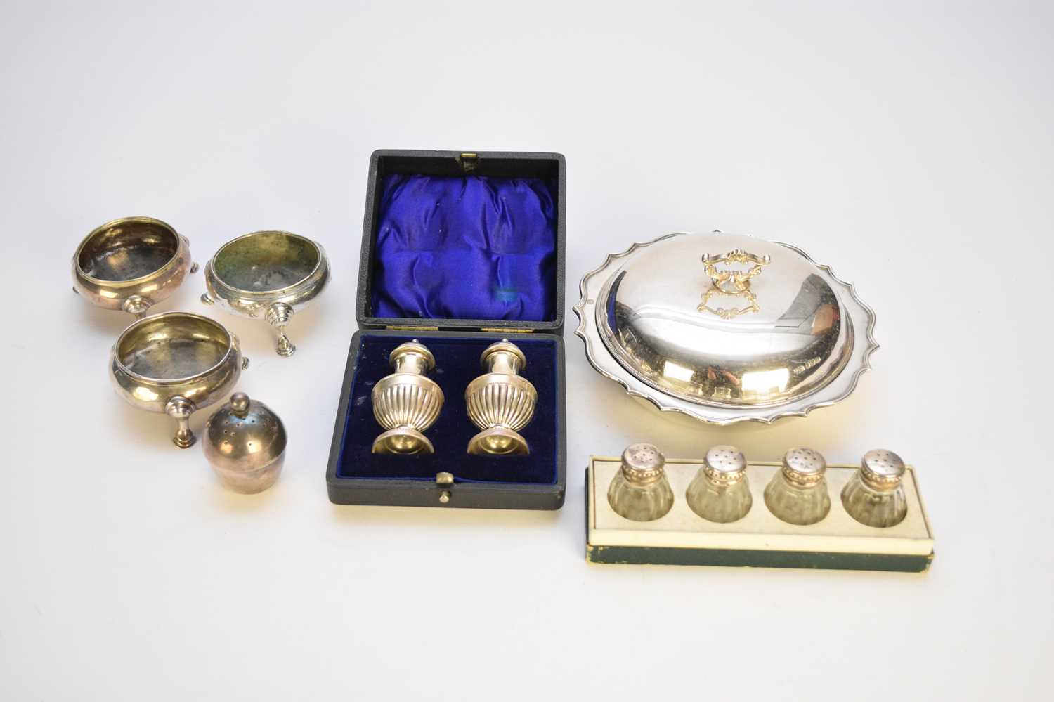Lot 51 - A collection of silver cruets and a silver muffin dish