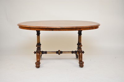 Lot 558 - A Victorian walnut oval centre table