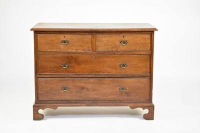 Lot 549 - A George III oak chest of drawers, 19th century