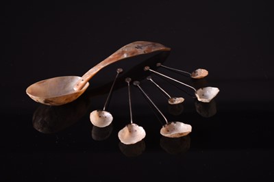 Lot 62 - A group of Chinese silver-mounted shell spoons together with a Japanese shell spoon