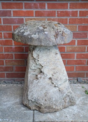 Lot 235 - Two antique cut weathered limestone staddle stones and caps