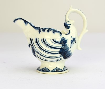 Lot 202 - A Derby porcelain dolphin cream boat, circa 1770