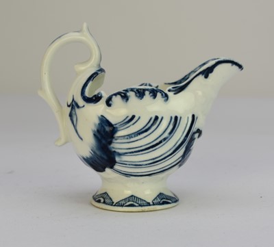 Lot 202 - A Derby porcelain dolphin cream boat, circa 1770