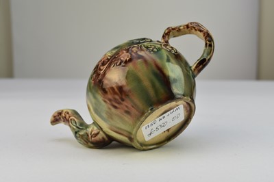 Lot 7 - A small Staffordshire teapot and cover c.1750, Whieldon glaze