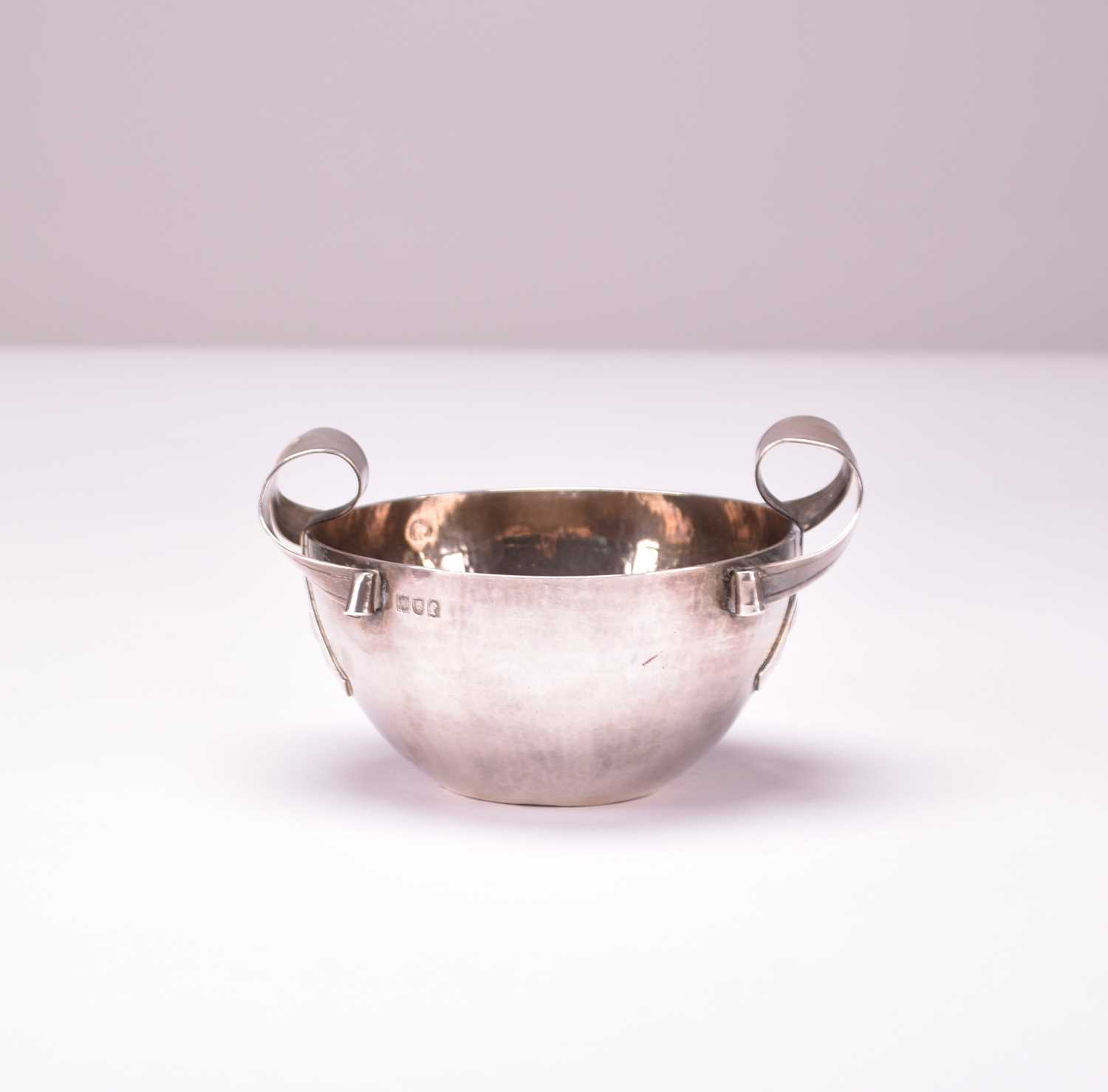 Lot 7 - An Arts and Crafts silver bowl by W G Connell