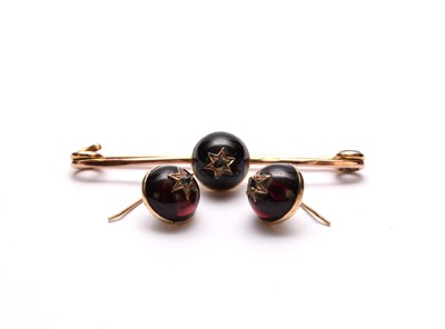 Lot 112 - A pair of cabochon garnet and rose cut diamond earrings and a bar brooch