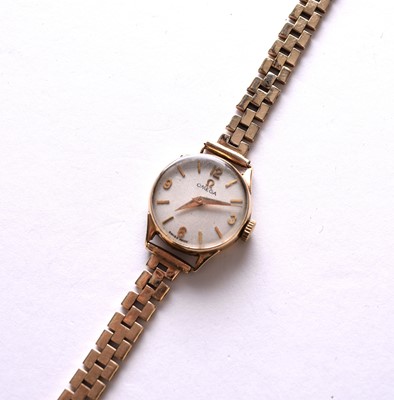 Lot 207 - Omega: A lady's 9ct gold bracelet watch