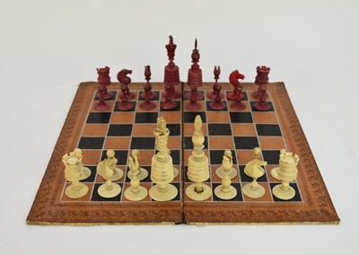 Lot 504 - An English carved bone chess set, late 19th century