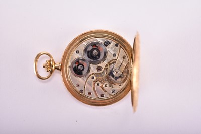 Lot 103 - Longines: An 18ct gold hunter pocket watch with 9ct rose gold Albert