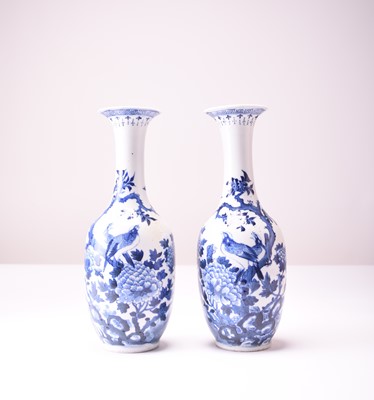 Lot 39 - A pair of Chinese blue and white bottle vases, 19th century