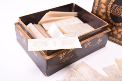 Lot 64 - A collection of Chinese mother-of-pearl gaming counters to a lacquer box