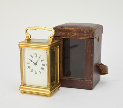 Lot 531 - A French gilt brass carriage clock with carrying case