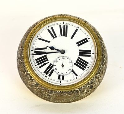 Lot 533 - An early 20th century gilt brass and embossed silvered metal strut clock