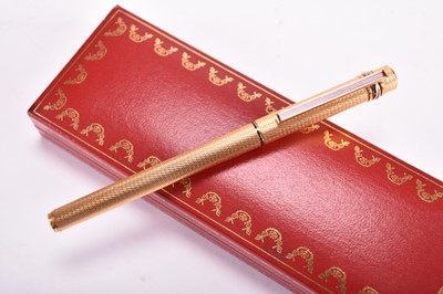 Lot 359 - Two Must de Cartier ballpoint pens