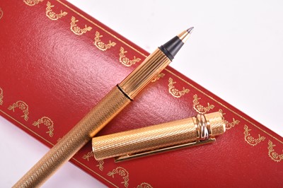 Lot 359 - Two Must de Cartier ballpoint pens