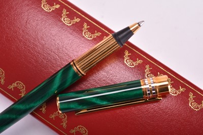 Lot 359 - Two Must de Cartier ballpoint pens