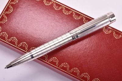 Lot 357 - A Cartier Pasha and a Must de Cartier ballpoint pens
