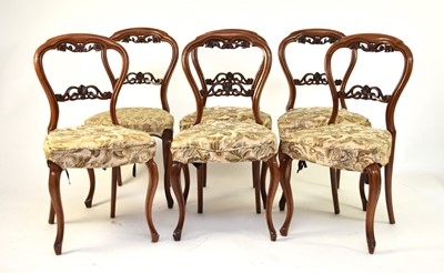 Lot 347 - A set of six Victorian rosewood balloon back dining chairs