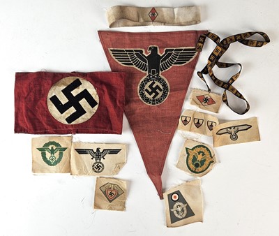 Lot 243 - German Third Reich NSDAP party armband and a group of post-war cloth