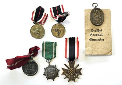 Lot 245 - Germany, Third Reich. Six awards including West Wall and Eastern People's Ostvolk medals