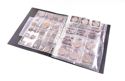 Lot 197 - An album of U.K. and Foreign silver, cupro-nickel, copper and bronze coinage