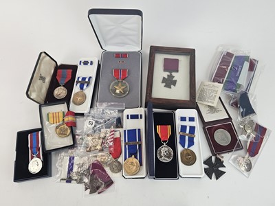 Lot 61 - An accumulation of modern medals, including...