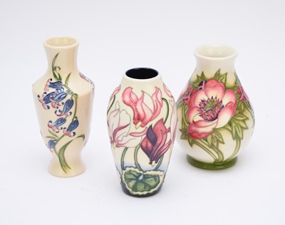 Lot 328 - Three Moorcroft vases, Bluebell Harmony and two Trials