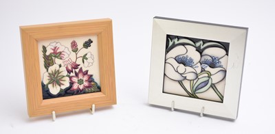 Lot 361 - A pair of contemporary Moorcroft square plaques, framed