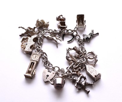 Lot 194 - A silver charm bracelet