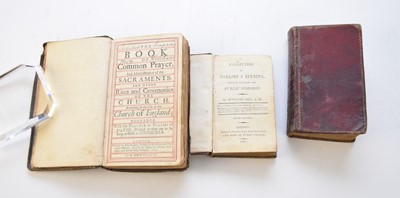 Lot 1083 - BOOK OF COMMON PRAYER, John Baskett, 1720. Ruled in red throughout. Contemporary panelled calf. With Book of Common Prayer, Oxford, 1798, contemporary red morocco.