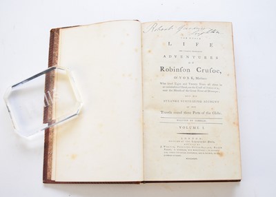 Lot 1084 - DEFOE, Daniel, The Whole Life and Strange Surprising Adventures of Robinson Crusoe, of York, Mariner. 2 vols. Logographic Press 1785. One plate in each vol. Contemporary diced calf.