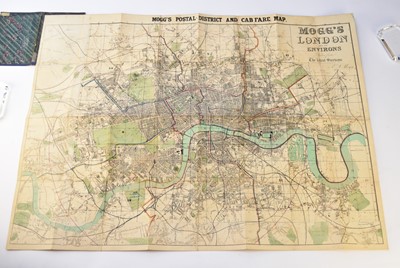 Lot 1086 - MOGG'S POSTAL DISTRICT  & Cab Fare Map of London. Hand coloured on linen, dated by hand 1867. 615 mm x 830 mm.