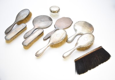 Lot 12 - A collection of silver mounted dressing table wares