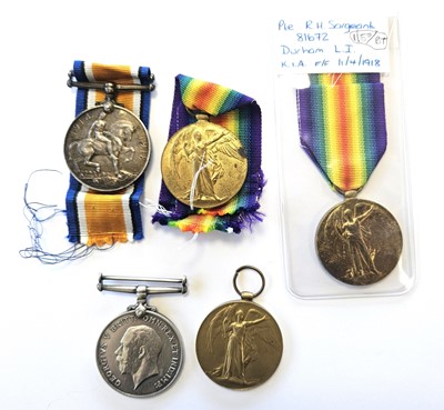 Lot 130 - Two WW1 medal pairs and a single Victory medal