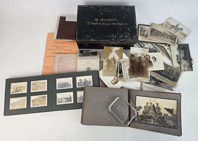 Lot 194 - Two military photograph albums, military postcards and other items